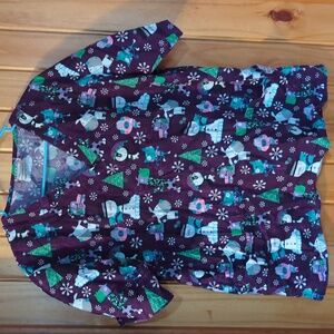 UA Scrubs winter themed scrub top, size large.